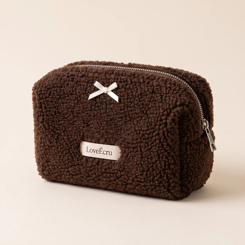 Chocolate-brown LoveÉcru teddy pouch with ivory bow and zip closure