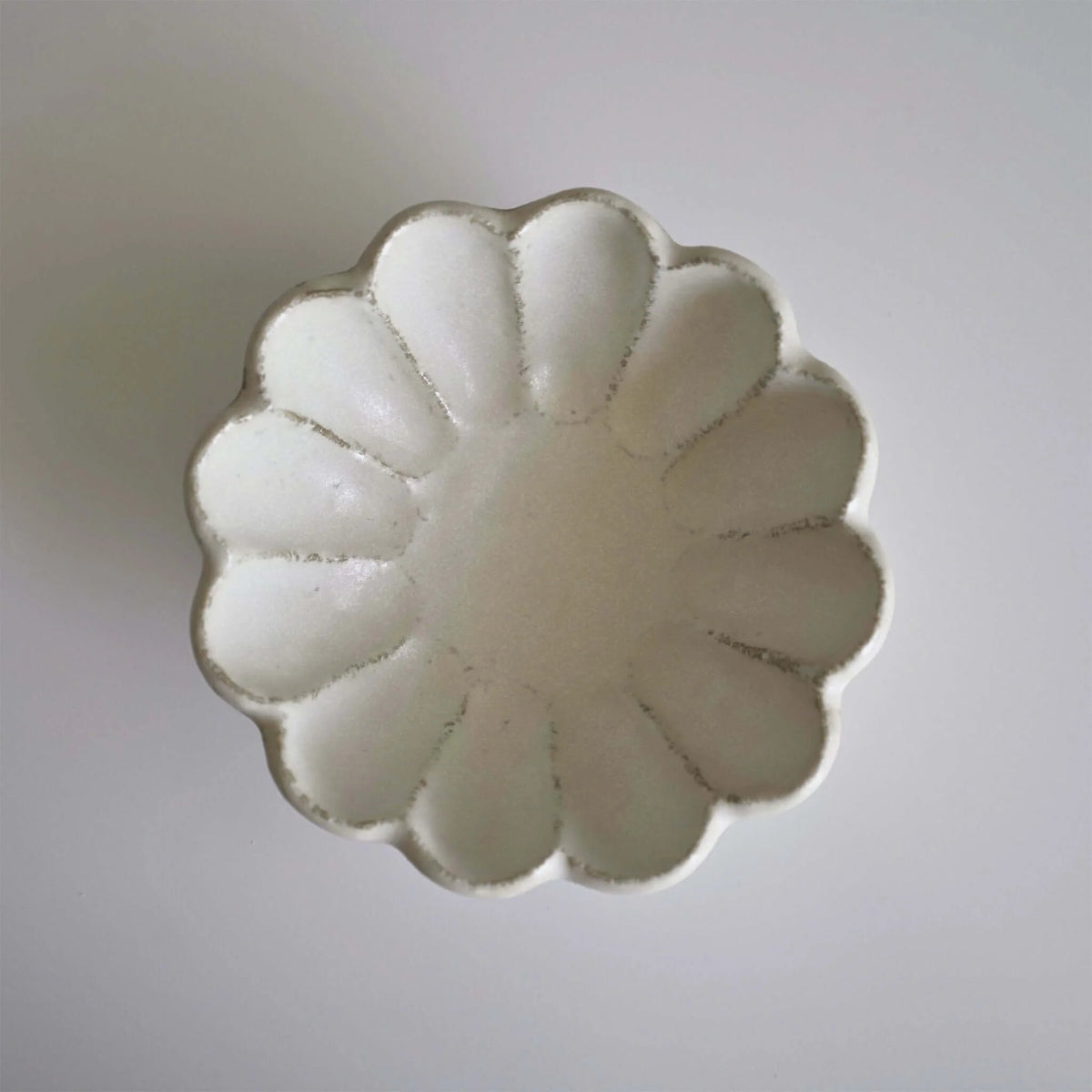 White Rinka 12 cm bowl detail; two bowls are included in this bundle.