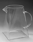 Aeris Frosted Glass Pitcher, empty, showing the angular base and handle