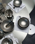 Host's Choice bundle table setting from above: Kyoto bowls, Set of Six plates, Elysian cutlery and Venice cups