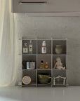 Stello Countertop Grid Shelf in a kitchen holding cups and jars
