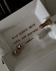 Wild Hearts ceramic tray with lipstick and jewellery, angled view