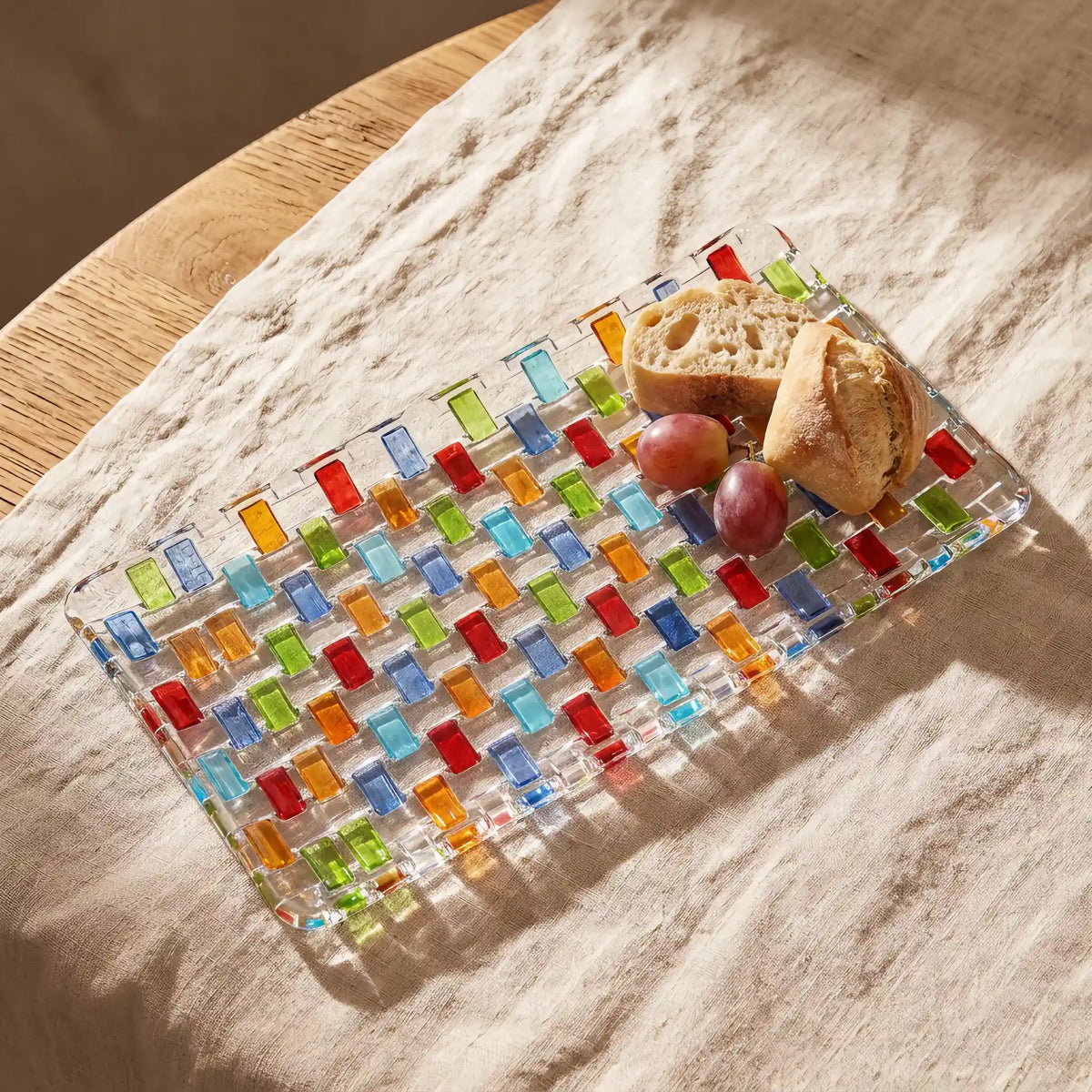 Tessera rectangular platter with bread and grapes on linen, seen from above