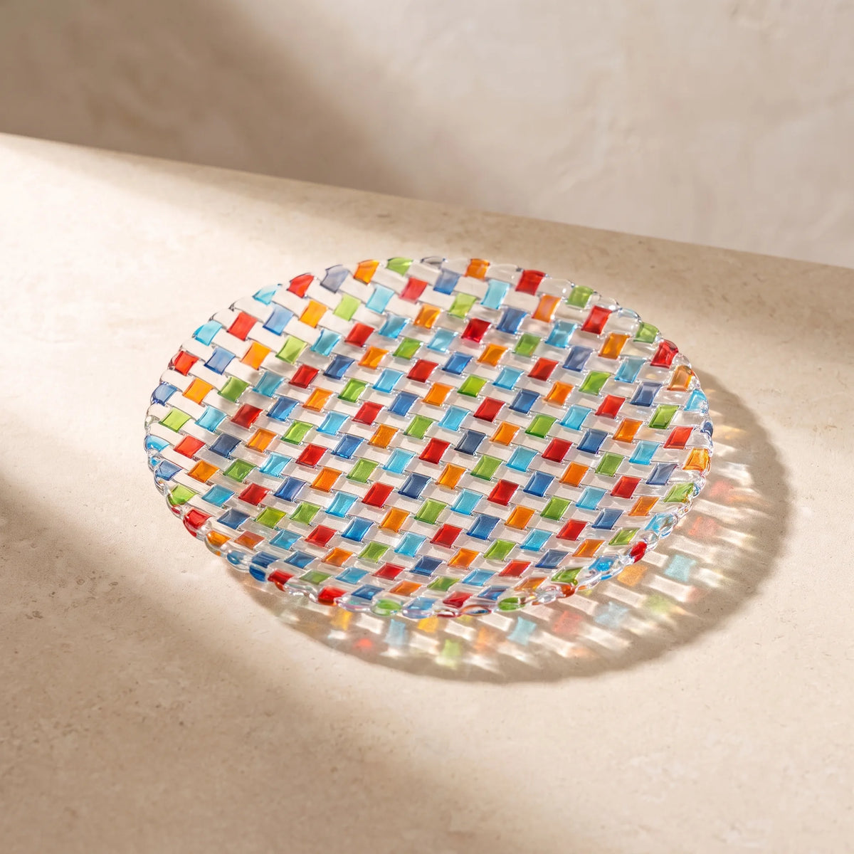 Tessera hand-painted mosaic plate 16.7 cm on sunlit pale stone