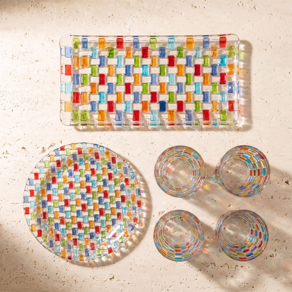 Everything in the rectangular Tessera Table set laid out from above: rectangular platter, 23.5 cm plate and four glasses
