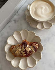 Elegant Rinka plate set with a croissant and coffee, showcasing Kaneko Kohyo's Japanese craftsmanship on a marble surface.