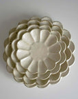 Elegant Rinka Plate 21cm by Kaneko Kohyo, handcrafted porcelain with flower-like design, perfect for enhancing your table setting.