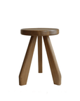 Meribel Stool crafted from imported teak wood, inspired by Alpine architecture, featuring manual polishing and charcoal burning finish.
