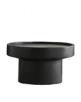 Black Seal Coffee Table with natural log texture and elegant design, perfect for creating an atmospheric space.