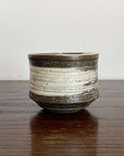 Wabi-Sabi Matcha Bowl on wooden surface, ceramic texture, ideal for Japanese tea, 9.8cm diameter x 7.7cm height. Made in Japan.