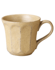 Handmade Rinka Mug in beige porcelain, Japanese craftsmanship, microwave and dishwasher safe, unique glaze texture.