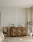 Medieval sideboard cabinet in modern living room setting with elegant decor and timeless appeal.