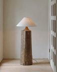 Rustic Stake Floor Lamp with linen shade and dimmable old wood base for cozy, mood-enhancing lighting in modern interiors.