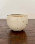 Rila Tea Cup by Minowares, featuring a warm matte color and textured design, perfect for tea or single-serve desserts.