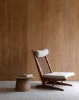 Hand-made Nakajima George Reclining Chair with teak wood and rattan weaving, offering pure lines and a romantic vibe.