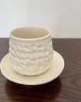 Shinogi Cup and Saucer Set by Masakazu Yoshida, featuring nature-inspired patterns, elegant and refreshing Yoshida Pottery Collection.