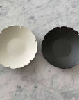 Elegant Yukiwa Plate by Yoshida Pottery with nature-inspired patterns, ideal for adding a sophisticated touch to any table setting.